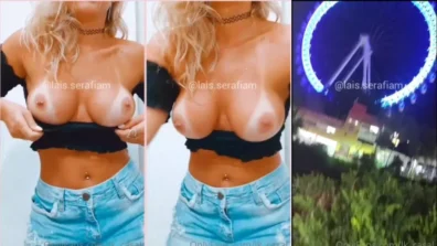 Lais display of top and denim skirt showing her breasts