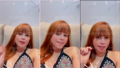 Bia Ruivinha commenting on her porn with two males