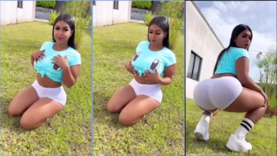 Andreamolina on all fours in the garden masturbating