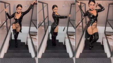 On the staircase of the house the delettraaoficial dressed as a cat woman is showing off